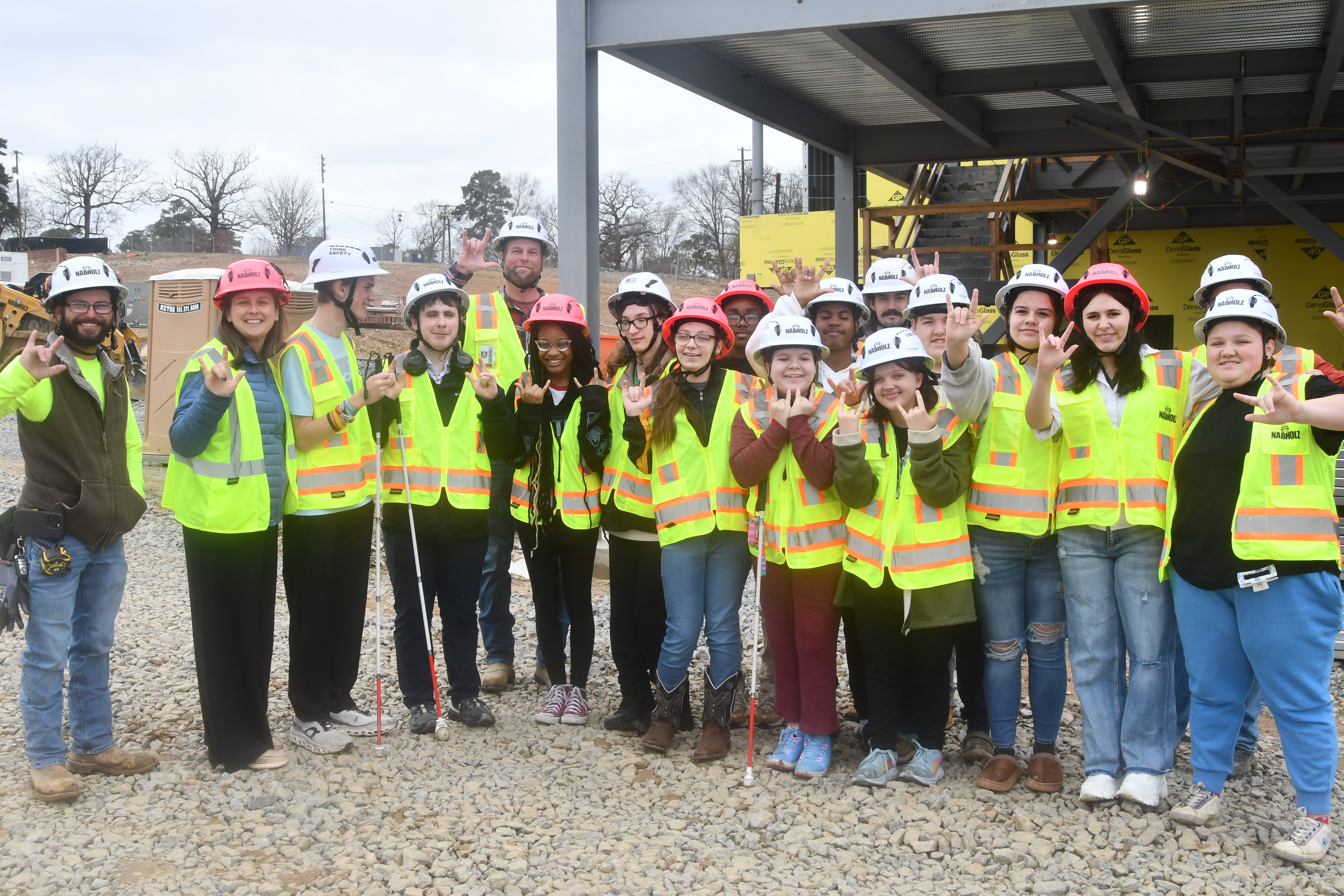 Student members of the Student Advisory Committee sign 